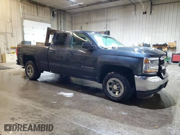 2017 Chevrolet Silverado 1500 Work Truck with VIN 1GCVKNEH8HZ194991, listed as a Copart auction lot 46935815 with 98,258 mi miles and Salvage title. Bid and sale history available at DreamBid. Image 4.