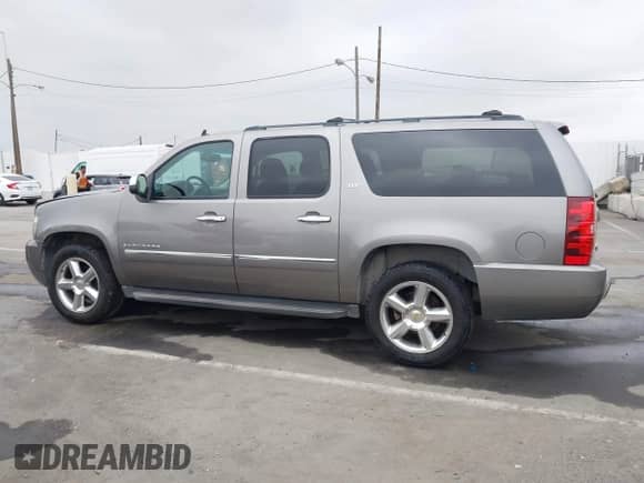 2012 Chevrolet Suburban LTZ z VIN 1GNSCKE09CR280447, wystawiony jako IAAI lot #42161888 z przebiegiem 246 533 mil mil oraz . Historia ofert i sprzedaży dostępna na DreamBid. Obrazek 14.