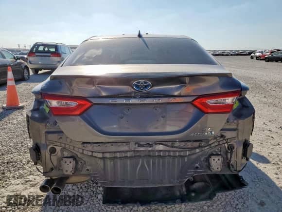 2019 Toyota Camry Hybrid SE с VIN 4T1B21HK4KU517243, выставлен на аукционе Copart как лот 83873985 с пробегом 99 571 миль миль и Списание • Salvage title. История ставок и продаж доступна на DreamBid. Изображение 6.