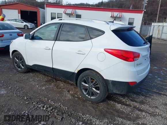 2014 Hyundai Tucson Walking Dead Edition z VIN KM8JUCAG6EU876024, wystawiony jako IAAI lot #41526297 z przebiegiem 213 196 mil mil oraz . Historia ofert i sprzedaży dostępna na DreamBid. Obrazek 3.