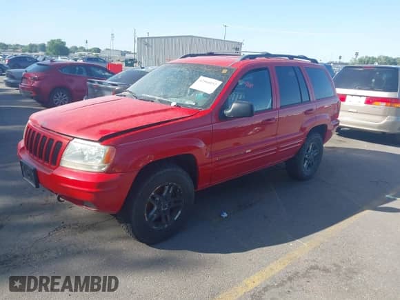 2000 Jeep Grand Cherokee Limited z VIN 1J4GW58N5YC186410, wystawiony jako IAAI lot #42504152 z przebiegiem 140 982 mil mil oraz . Historia ofert i sprzedaży dostępna na DreamBid. Obrazek 2.