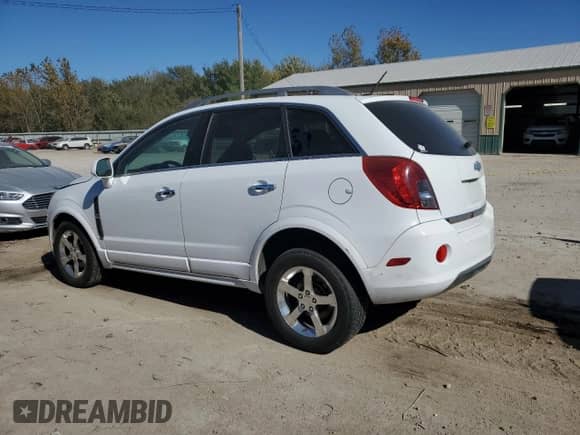 2013 Chevrolet Captiva Sport LT with VIN 3GNFL3EK3DS519918, listed as a Copart auction lot 76310344 with 128,423 mi miles and Salvage title. Bid and sale history available at DreamBid. Image 2.