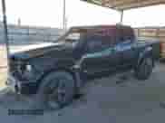 2010 Nissan Frontier LE with VIN 1N6AD0EV5AC446672, listed as a Copart auction lot 89176925 with 107,171 mi miles and Salvage title. Bid and sale history available at DreamBid. Image 1.