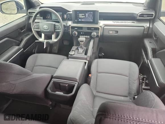 2024 Toyota Tacoma SR5 with VIN 3TYLB5JN2RT035281, listed as a Copart auction lot 69350095 with 9,907 mi miles and Salvage title. Bid and sale history available at DreamBid. Image 8.