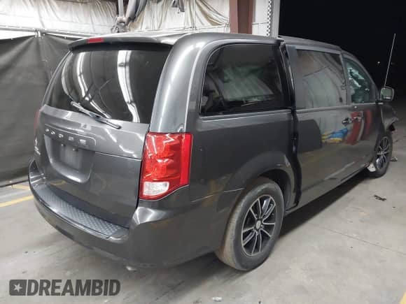 2018 Dodge Grand Caravan SE with VIN 2C4RDGBG8JR303954, listed as a IAAI auction lot 42385878 with 70,320 mi miles and . Bid and sale history available at DreamBid. Image 4.