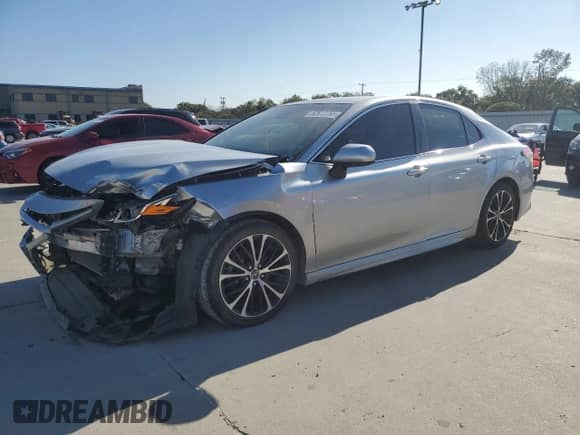 2018 Toyota Camry SE с VIN 4T1B11HK2JU002582, выставлен на аукционе Copart как лот 82613755 с пробегом 133 835 миль миль и Списание • Salvage title. История ставок и продаж доступна на DreamBid. Изображение 1.