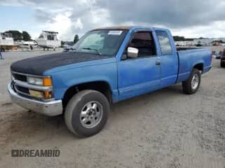 1991 GMC Sierra 1500 with VIN 2GTEK19K4M1550600, listed as a Copart auction lot 64989285 with 287,975 mi miles and Salvage title. Bid and sale history available at DreamBid. Image 1.