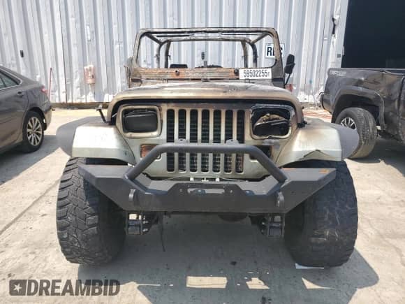 1992 Jeep Wrangler with VIN 2J4FY39S8NJ507873, listed as a Copart auction lot 59502255 with Not provided miles and Salvage title. Bid and sale history available at DreamBid. Image 5.