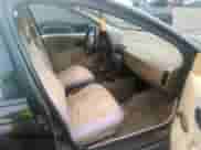 1996 Saturn SL z VIN 1G8ZH5285TZ165343, wystawiony jako IAAI lot #39067128 z przebiegiem 88 380 mil mil oraz . Historia ofert i sprzedaży dostępna na DreamBid. Obrazek 5.