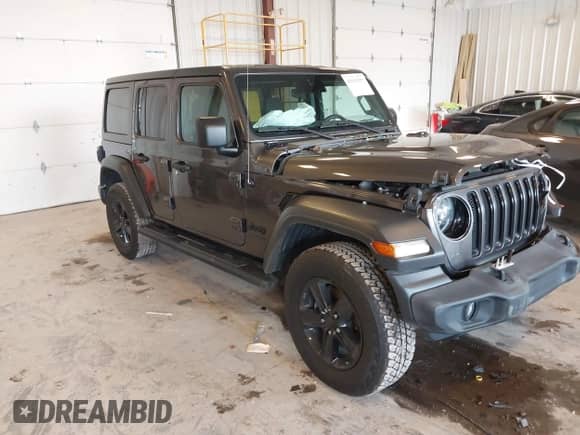 2021 Jeep Wrangler Unlimited 80th Anniversary with VIN 1C4HJXDG2MW582413, listed as a IAAI auction lot 43151537 with 36,068 mi miles and . Bid and sale history available at DreamBid. Image 1.