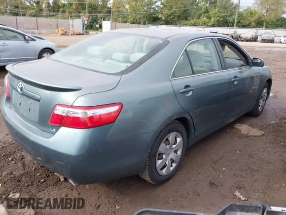 2007 Toyota Camry LE с VIN JTNBK46K373010822, выставлен на аукционе IAAI как лот 43389924 с пробегом 159 358 миль миль и . История ставок и продаж доступна на DreamBid. Изображение 4.