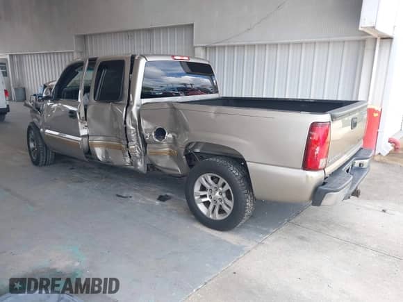 2002 Chevrolet Silverado 1500 LS with VIN 2GCEC19T221427915, listed as a IAAI auction lot 43143055 with Not provided miles and . Bid and sale history available at DreamBid. Image 3.