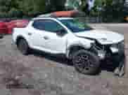 2024 Hyundai Santa Cruz SEL z VIN 5NTJC4DE0RH104577, wystawiony jako IAAI lot #42856361 z przebiegiem 39 628 mil mil oraz . Historia ofert i sprzedaży dostępna na DreamBid. Obrazek 1.