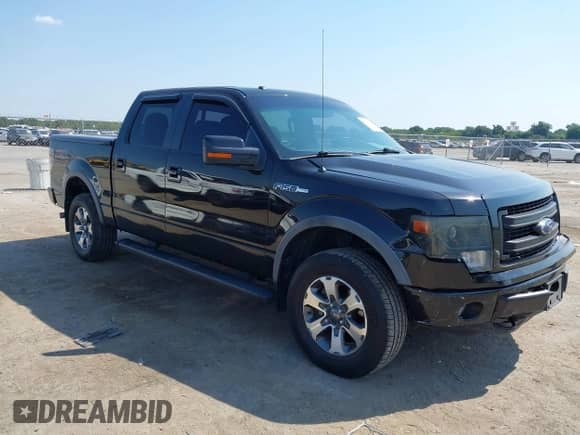 2014 Ford F-150 XLT with VIN 1FTFW1E64EFD14542, listed as a IAAI auction lot 43034880 with 197,620 mi miles and . Bid and sale history available at DreamBid. Image 1.