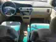 2004 Honda Odyssey LX with VIN 5FNRL18534B143388, listed as a Copart auction lot 68346135 with 160,563 mi miles and Salvage title. Bid and sale history available at DreamBid. Image 8.