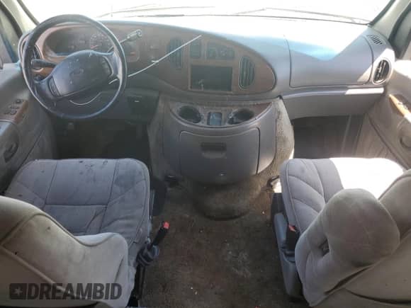 1999 Ford Econoline Cargo z VIN 1FDRE14WXXHB10462, wystawiony jako Copart lot #57916315 z przebiegiem 117 071 mil mil oraz Szkoda całkowita • Salvage title. Historia ofert i sprzedaży dostępna na DreamBid. Obrazek 8.