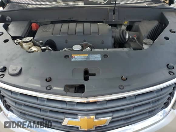 2015 Chevrolet Traverse LS with VIN 1GNKVFKD4FJ130127, listed as a Copart auction lot 81516885 with 134,213 mi miles and Salvage title. Bid and sale history available at DreamBid. Image 12.