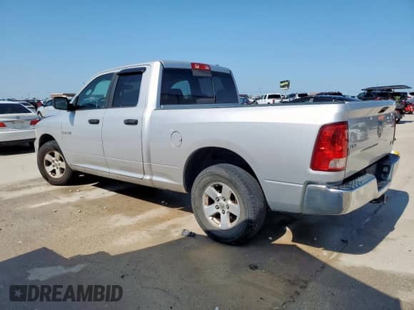 2009 Dodge 1500 SLT with VIN 1D3HB18P09S727216, listed as a Copart auction lot 63449005 with 242,630 mi miles and Clean title. Bid and sale history available at DreamBid. Image 2.