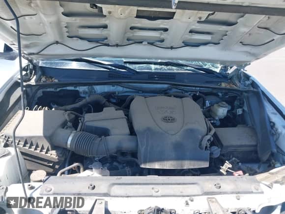 2020 Toyota Tacoma SR5 with VIN 5TFAZ5CN3LX093798, listed as a IAAI auction lot 42212050 with 85,632 mi miles and . Bid and sale history available at DreamBid. Image 10.