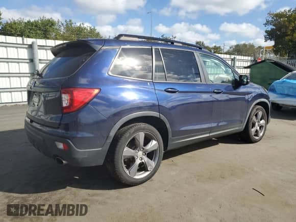 2020 Honda Passport Touring with VIN 5FNYF7H94LB000182, listed as a Copart auction lot 42665365 with 58,051 mi miles and Salvage title. Bid and sale history available at DreamBid. Image 3.