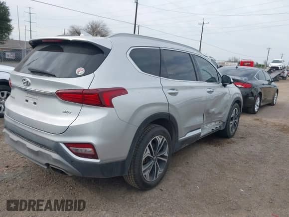 2019 Hyundai Santa Fe Limited with VIN 5NMS53AA4KH061342, listed as a IAAI auction lot 41573631 with 98,498 mi miles and . Bid and sale history available at DreamBid. Image 4.