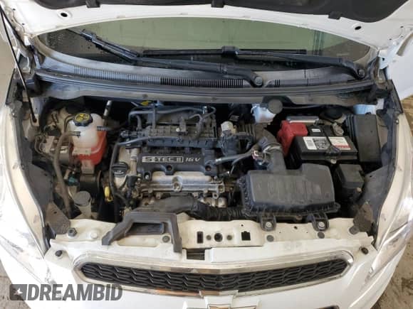2015 Chevrolet Spark LS with VIN KL8CA6S91FC807202, listed as a Copart auction lot 85593935 with 91,554 mi miles and Salvage title. Bid and sale history available at DreamBid. Image 12.