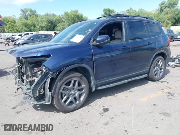 2023 Honda Passport EX-L with VIN 5FNYF8H50PB007445, listed as a IAAI auction lot 42462561 with 33,540 mi miles and . Bid and sale history available at DreamBid. Image 18.