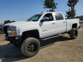 2018 Chevrolet Silverado 2500HD LT with VIN 1GC1KVEYXJF273908, listed as a Copart auction lot 58822005 with 60,213 mi miles and Salvage title. Bid and sale history available at DreamBid. Image 1.
