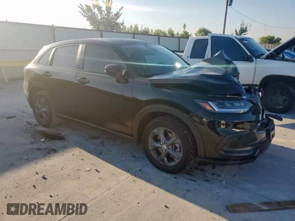 2026 Honda HR-V LX with VIN 3CZRZ1H36TM706418, listed as a Copart auction lot 80253215 with 3,963 mi miles and Salvage title. Bid and sale history available at DreamBid. Image 4.