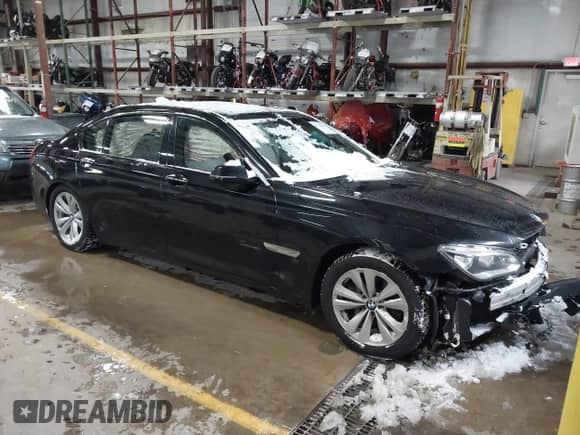 2013 BMW 7 Series 740Li xDrive with VIN WBAYF4C56DD127914, listed as a IAAI auction lot 41370207 with 138,619 mi miles and . Bid and sale history available at DreamBid. Image 1.