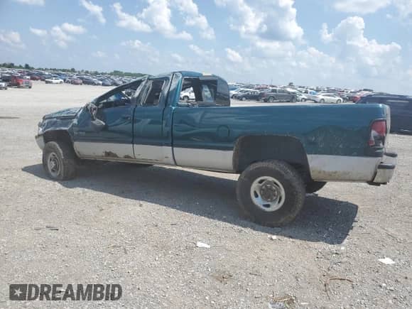 1999 Dodge 2500 with VIN 3B7KF2360XG203981, listed as a Copart auction lot 62489195 with Not provided miles and Salvage title. Bid and sale history available at DreamBid. Image 2.
