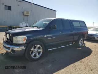 2007 Dodge 1500 SLT with VIN 1D7HA18297J588129, listed as a Copart auction lot 86981925 with 215,816 mi miles and Salvage title. Bid and sale history available at DreamBid. Image 1.