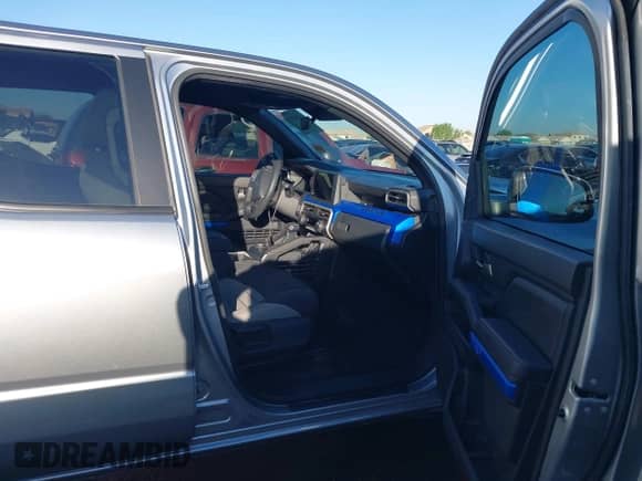 2024 Toyota Tacoma SR5 with VIN 3TMKB5FN2RM001972, listed as a IAAI auction lot 43362889 with 21,644 mi miles and . Bid and sale history available at DreamBid. Image 5.