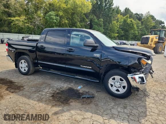 2020 Toyota Tundra SR5 with VIN 5TFEY5F12LX267034, listed as a Copart auction lot 84702905 with 37,338 mi miles and Salvage title. Bid and sale history available at DreamBid. Image 4.