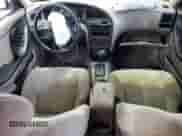 2003 Hyundai Elantra GLS с VIN KMHDN45D63U597301, выставлен на аукционе Copart как лот 69960655 с пробегом Не указан миль и Списание • Salvage title. История ставок и продаж доступна на DreamBid. Изображение 8.