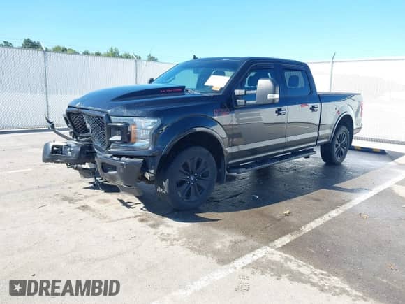 2019 Ford F-150 XLT with VIN 1FTFW1E46KFB92504, listed as a IAAI auction lot 43063673 with 145,773 mi miles and . Bid and sale history available at DreamBid. Image 2.