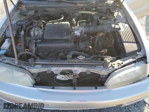 1996 Honda Accord EX z VIN 1HGCE6677TA009168, wystawiony jako Copart lot #87601175 z przebiegiem 179 157 mil mil oraz Szkoda całkowita • Salvage title. Historia ofert i sprzedaży dostępna na DreamBid. Obrazek 11.