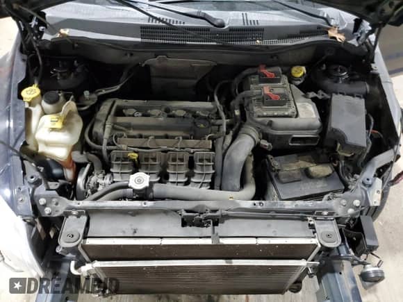 2011 Dodge Caliber z VIN 1B3CB1HA1BD111194, wystawiony jako Copart lot #82080054 z przebiegiem 133 455 mil mil oraz Szkoda całkowita • Salvage title. Historia ofert i sprzedaży dostępna na DreamBid. Obrazek 11.