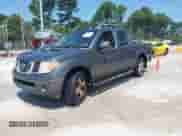2006 Nissan Frontier SE with VIN 1N6AD07U26C428450, listed as a IAAI auction lot 42812012 with 194,915 mi miles and . Bid and sale history available at DreamBid. Image 2.