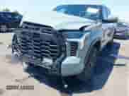 2024 Toyota Tundra SR5 with VIN 5TFLA5ECXRX035045, listed as a IAAI auction lot 42762521 with 23,439 mi miles and . Bid and sale history available at DreamBid. Image 6.