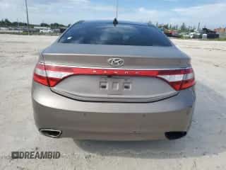 2012 Hyundai Azera с VIN KMHFH4JG1CA194151, выставлен на аукционе Copart как лот 72110094 с пробегом 98 178 миль миль и Списание • Salvage title. История ставок и продаж доступна на DreamBid. Изображение 6.
