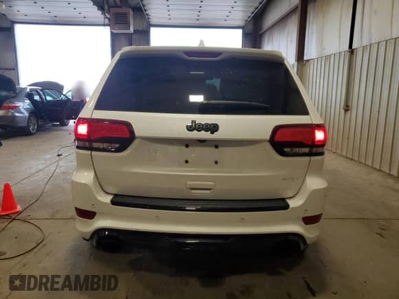 2020 Jeep Grand Cherokee SRT с VIN 1C4RJFDJ7LC413465, выставлен на аукционе Copart как лот 81673085 с пробегом 79 815 миль миль и Списание • Salvage title. История ставок и продаж доступна на DreamBid. Изображение 6.