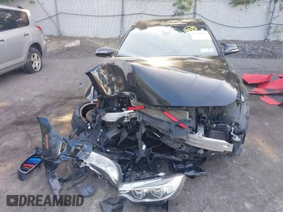 2015 BMW 4 Series 435i with VIN WBA4B1C55FD418299, listed as a IAAI auction lot 42794656 with 69,554 mi miles and . Bid and sale history available at DreamBid. Image 13.