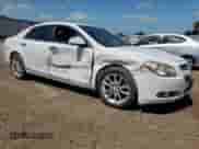 2009 Chevrolet Malibu LTZ with VIN 1G1ZK57739F105314, listed as a Copart auction lot 61207285 with 215,794 mi miles and Salvage title. Bid and sale history available at DreamBid. Image 4.