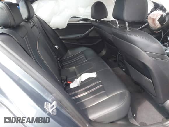 2019 BMW 5 Series 530i with VIN WBAJA5C52KWW44781, listed as a IAAI auction lot 42856522 with 102,648 mi miles and . Bid and sale history available at DreamBid. Image 8.