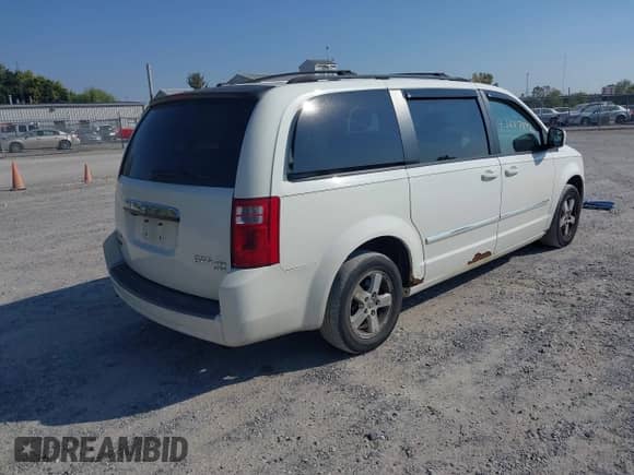 2009 Dodge Grand Caravan SXT with VIN 2D8HN54139R583365, listed as a IAAI auction lot 43247842 with 174,640 mi miles and . Bid and sale history available at DreamBid. Image 4.