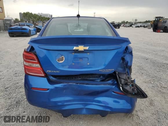 2017 Chevrolet Sonic LS с VIN 1G1JB5SHXH4159524, выставлен на аукционе Copart как лот 63402325 с пробегом 106 620 миль миль и Списание • Salvage title. История ставок и продаж доступна на DreamBid. Изображение 6.