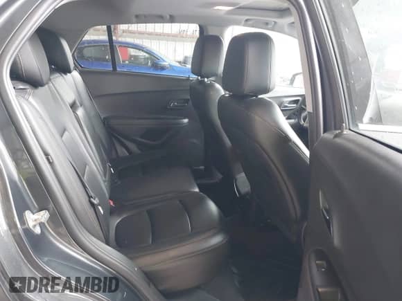 2017 Chevrolet Trax Premier z VIN 3GNCJRSB4HL248531, wystawiony jako IAAI lot #42296367 z przebiegiem 170 258 mil mil oraz . Historia ofert i sprzedaży dostępna na DreamBid. Obrazek 8.