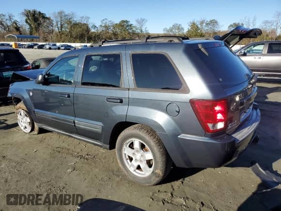2006 Jeep Grand Cherokee Laredo z VIN 1J8HR48N56C350031, wystawiony jako Copart lot #81686564 z przebiegiem 244 125 mil mil oraz Szkoda całkowita • Salvage title. Historia ofert i sprzedaży dostępna na DreamBid. Obrazek 2.