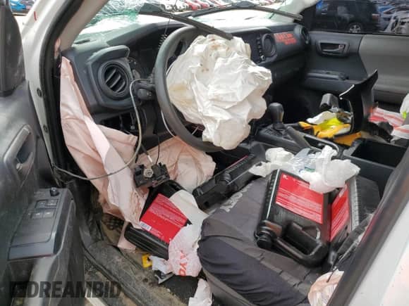 2020 Toyota Tacoma SR с VIN 3TYSX5EN3LT000067, выставлен на аукционе Copart как лот 55726575 с пробегом Не указан миль и Списание • Salvage title. История ставок и продаж доступна на DreamBid. Изображение 8.